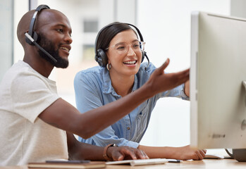 Canvas Print - Do you see how confusing that is. Shot of two call center workers together.