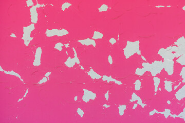 Wall Mural - Photo of an aged, weathered pink colored stucco on a wall in a slight out of focus, to use as a background