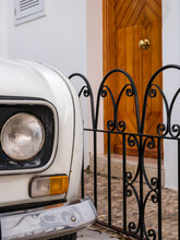 Detail View Of A Renault 4 Car Parked In Front Of A Spanish Village House