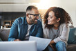 © Delmaine Donson/peopleimages.com - Decision-making is a team task. Shot of a young couple planning their budget together at home.