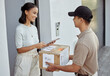 © Siphosethu F/peopleimages.com - Delivery for you maam. Shot of a young woman signing for an order with a delivery man using a digital tablet.