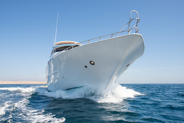 Wall Mural - Luxury private motor yacht sailing at sea