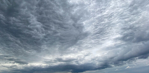 Wall Mural - Dark blue cloudy sky with low clouds