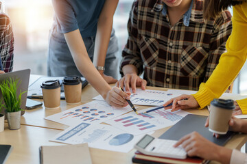 Wall Mural - Group of young business people meeting working with new startup project idea presentation analyze plan marketing and investment.