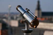 Close Up View Of A Telescope Used By Tourists To See The Most Important Landmarks Of The City.