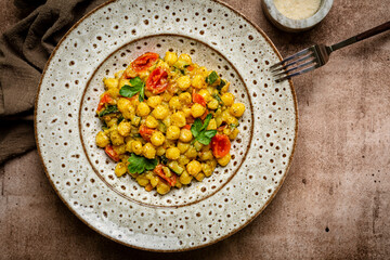 Poster - Potato Gnocchi with Pesto Sauce, Zucchini and Tomato. Top view, closs up. Vegetarian food.