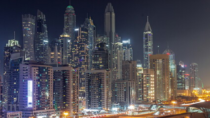 Dubai marina tallest block of skyscrapers all night timelapse.
