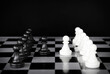 © sai - chess game.business leader concept.Selective focus.on a dark background.