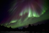 Fototapeta Tęcza - Magnificent Aurora Borealis in Inari Lapland Finland March 2022.