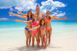 © Spotmatik - Portrait of Caucasian family on beach enjoying holiday