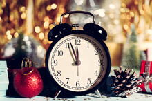 Alarm Clock Surrounded By Christmas Decoration