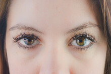 Cropped Image Of Woman's Questioning Eyes