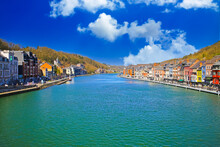 Dinatn, Belgium - March 9. 2022: Panoramic View On River Meuse With Old Idyllic Village, Blue Sky, Fluffy Clouds