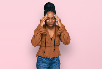 Poster - Young african american woman wearing casual clothes with hand on head for pain in head because stress. suffering migraine.