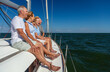 Retired friends enjoying carefree travel on luxury yacht