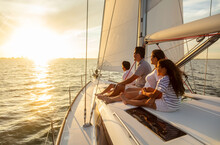 Family Travel Adventures On Luxury Yacht At Sunset