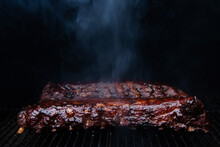 Barbecue Ribs Cooking On Smoker Grill