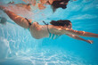 © Sergey Novikov - Pregnant woman swim in the pool underwater
