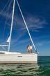 © Spotmatik - Young Latino family on yacht enjoying tropical vacation