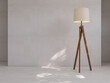 3D render mock up background, a vintage wooden tripod standing lamp with cloth lampshade in a concrete loft gallery with sunlight and leaves shadow. Backdrop, Space, Blank, Empty, Gray, Modern, Empty.