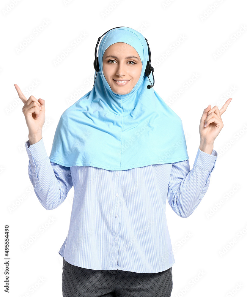 Muslim secretary with headset pointing at something on white background