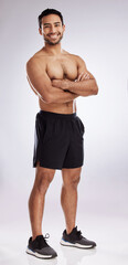 Canvas Print - Feeling more confident in my body. Shot of a handsome young man against a studio background.