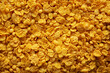 © Liudmyla - Tasty Corn Flakes Background, top view.