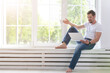 © aletia2011 - handsome young man with laptop at home