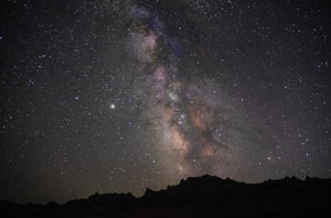 Wall Mural - Magical view of the Milky Way starry sky over the Badlands National Park