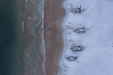 Sticker - Aerial view of boats on the coastline during winter