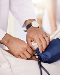 Canvas Print - Let me check you blood pressure. Shot of a male doctor examining a senior patient with a blood pressure gauge.