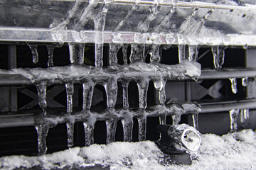 Wall Mural - Truck radiator with ice on front in the middle of winter