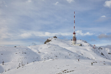 Winter landscape of transmitter tower in the mountains