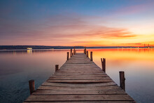 Small Dock And The Lake At Sunset