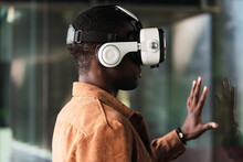 Cheerful Black Man In VR Headset