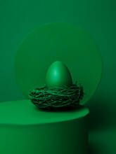 Green Egg And Bird Nest On The Podium On Forest Green Background. Minimal Easter Holiday Or Food Concept. Creative Abstract Festive Easter Showcase For Product Presentation.