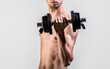 © Yevhen - Weak man lift a weight, dumbbells, biceps, muscle, fitness. Nerd maleraising a dumbbell. Man holding dumbbell in hand. Skinny guy hold dumbbells up in hands