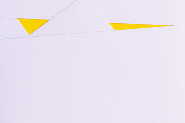 Poster - geometric background with light lavender papers and bright yellow triangles.