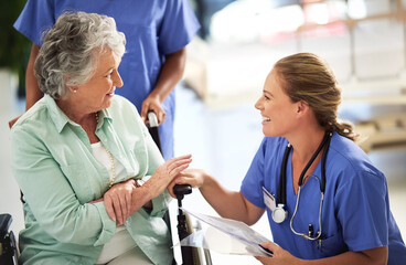 Poster - Ive got some good news for you. Shot of a doctor discussing treatments with a senior woman sitting in wheelchair in a hospital.