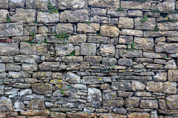 Poster - Texture of a stone wall. Old castle stone wall texture background.