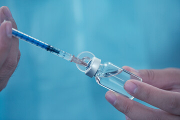 Photo of photos of ampoules for injection on white background