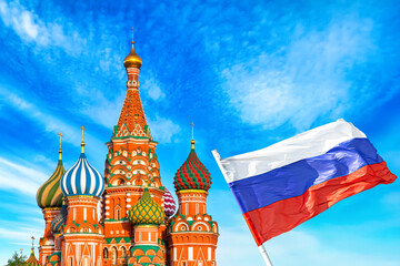 Wall Mural - St. Basil Cathedral at Moscow Red Square with Russian flag. Summer sunny day. World famous Russian Moscow landmark.