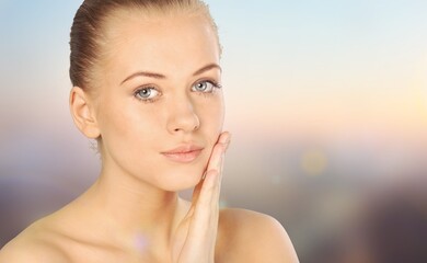 Poster - Young beautiful woman with a mesh of thread lifting on her face. Professional cosmetology concept.