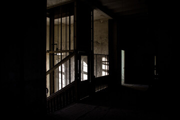 Wall Mural - Dark interior of an old abandoned building