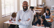 © Kobus Louw/peopleimages.com - Welcome to our world of learning. Portrait of mature man teaching a class of teenage students.