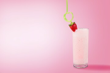 Wall Mural - Glass of strawberry yogurt on color pastel  background