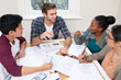 © Marius V/peopleimages.com - Working on it together. Cropped shot of a group of university students in a study group.