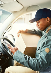 Sticker - Finding the quickest route to his next delivery. Shot of a courier using a cellphone while sitting in a delivery van.