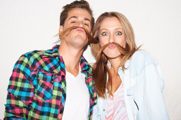 Canvas Print - Check our moustaches. Shot of a stylish hipster couple.