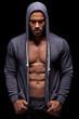 © D M/peopleimages.com - Getting his fitness on. Studio shot of a muscular young man wearing a hoodie isolated on black.
